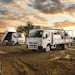 Fuso Canter truck featured parked at dusk